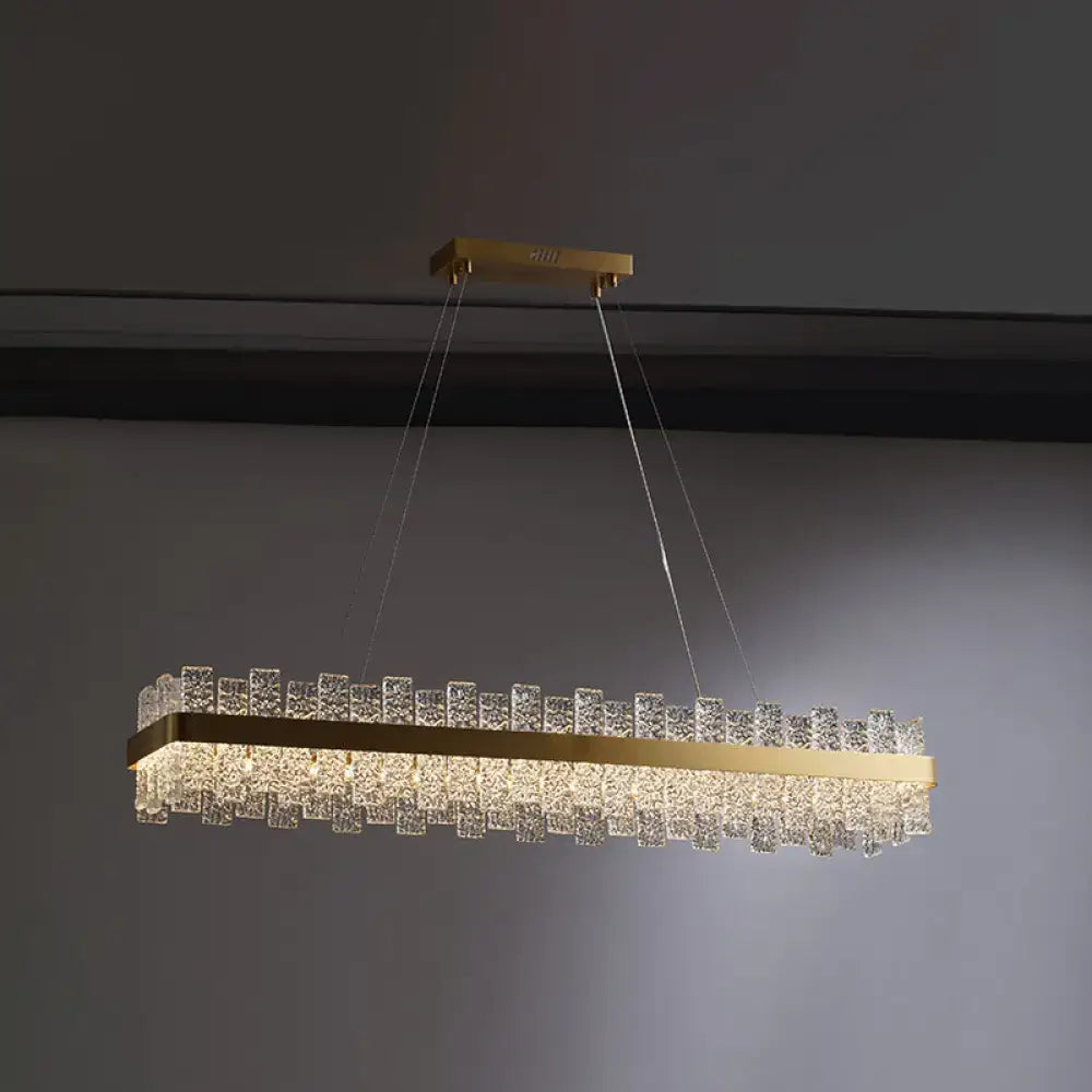 DecorBites™ Modern Crystal Loop Pendant Light with Brass Finish and LED