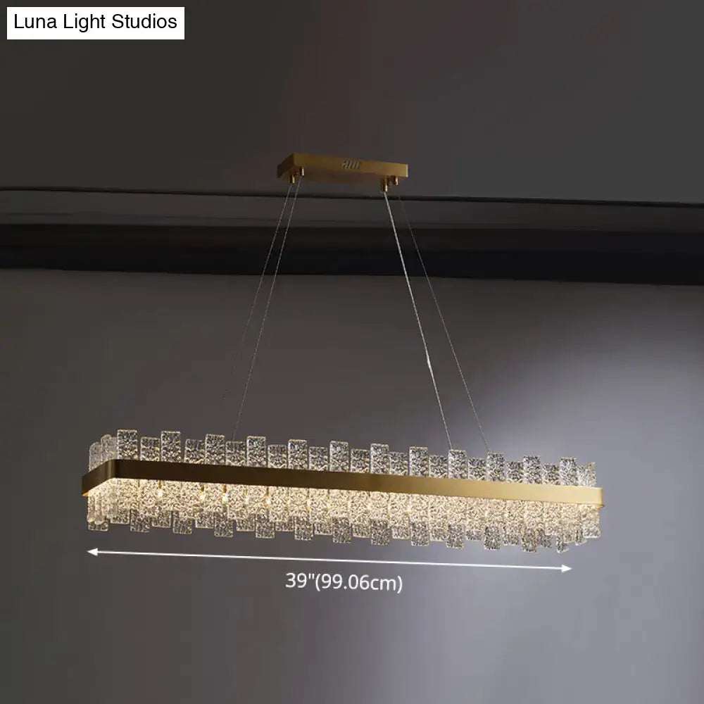 DecorBites™ Modern Crystal Loop Pendant Light with Brass Finish and LED