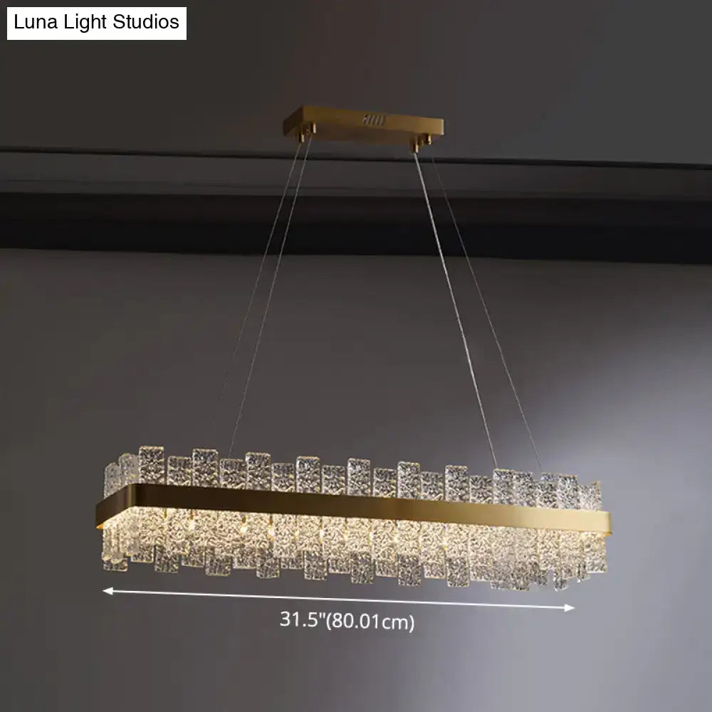 DecorBites™ Modern Crystal Loop Pendant Light with Brass Finish and LED