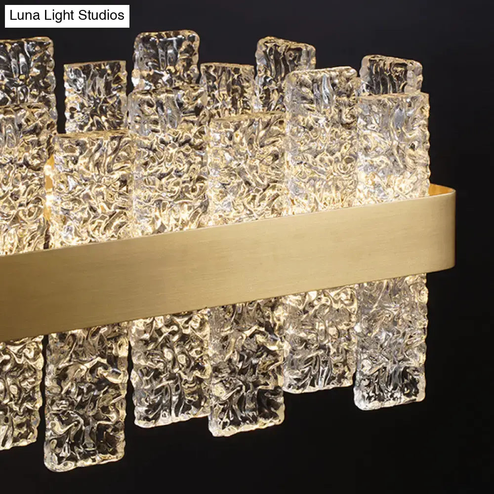 DecorBites™ Modern Crystal Loop Pendant Light with Brass Finish and LED