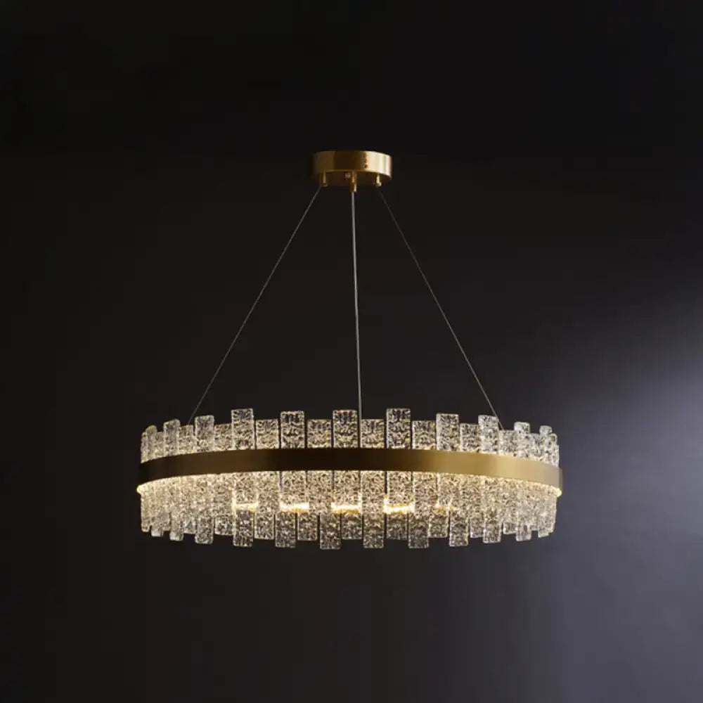 DecorBites™ Modern Crystal Loop Pendant Light with Brass Finish and LED