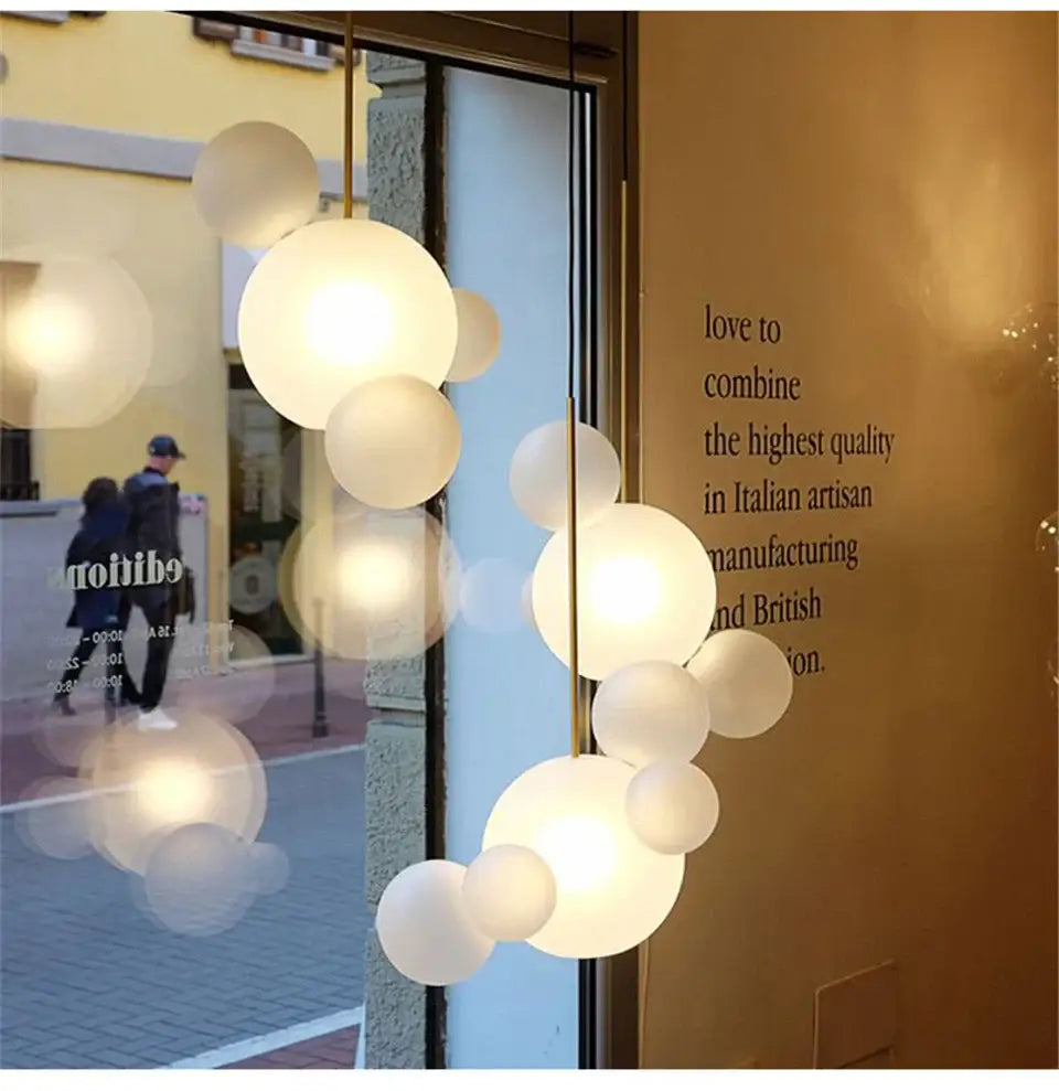 DecorBites modern led bubble ball chandelier with frosted glass orbs and brass finish ideal for living room lighting