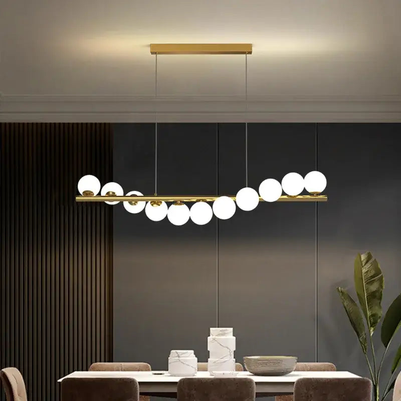 Decorbites modern led glass chandelier with gold-toned horizontal bar and white spherical bulbs for dining room lighting