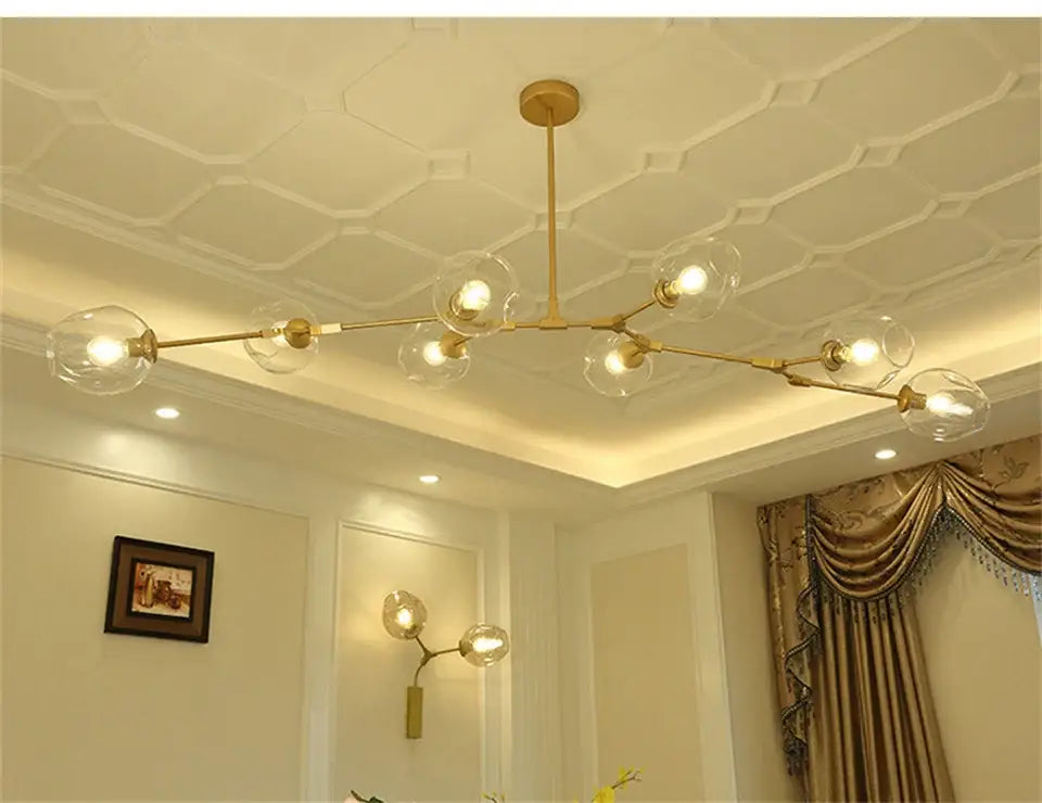 Gold-toned DecorBites™ modern nordic lustre glass chandelier with clear globe bulbs and energy-saving led lighting