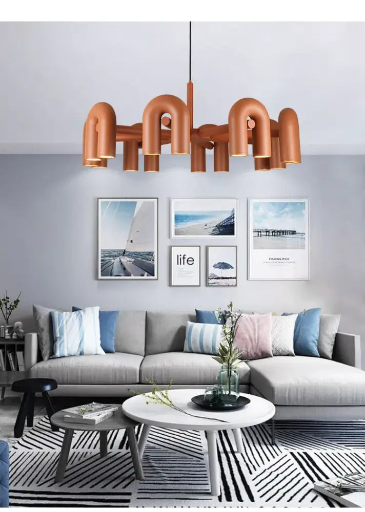Decorbites modern nordic copper-toned led ceiling chandelier with curved pipe-like arms and central hanging rod