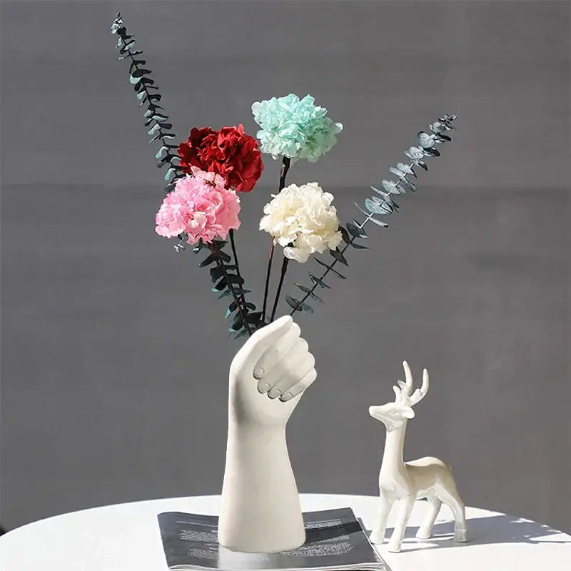 DecorBites™ modern nordic style white ceramic hand vase holding colorful artificial flowers for home decor