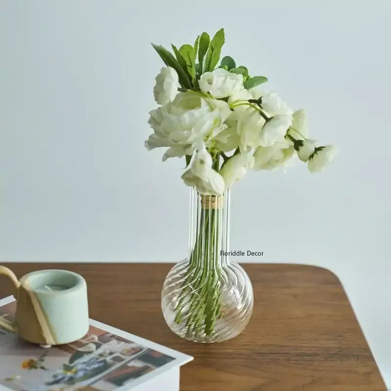 Decorbites™ modern transparent glass vase with fluted ribbed design and rounded base to decorate root spaces