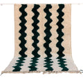 DecorBites™ moroccan handmade beni ouarain rug with cream and dark green wavy pattern and plush textured surface
