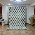 DecorBites™ moroccan handmade blessed beni ourain rug black and white checkered with fluffy texture and fringed edges