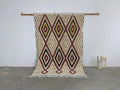 Beige maroon and black geometric-patterned decorated bites moroccan handmade traditional azilal rug with fringed edges
