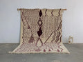 Beige and burgundy geometric-patterned wool beni ouarain rug with fringed edges in 307 x 213 cm size