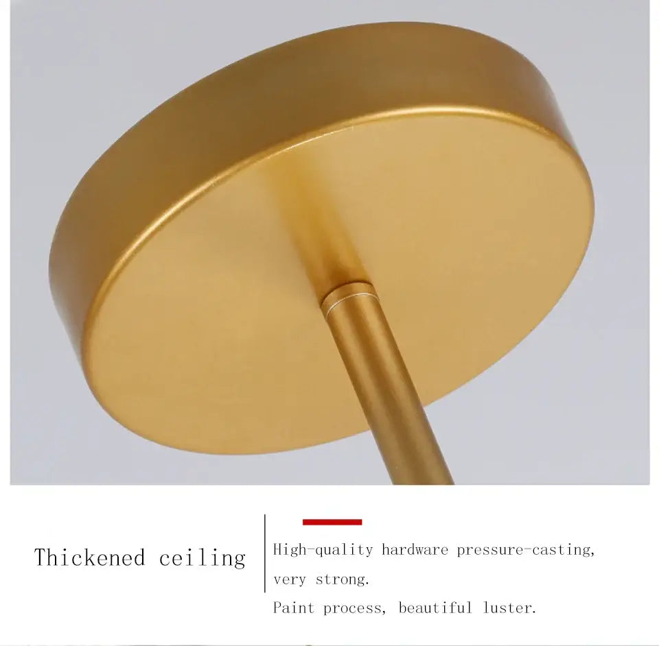 Gold-colored circular ceiling mount with metallic finish and sturdy stem for DecorBites™ nordic chandelier in living rooms