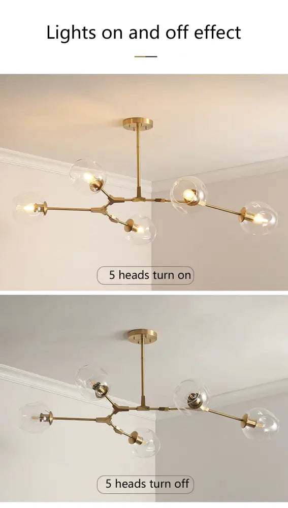 Gold-toned modern nordic chandelier with five clear glass globe lights for dining and living rooms by DecorBites™