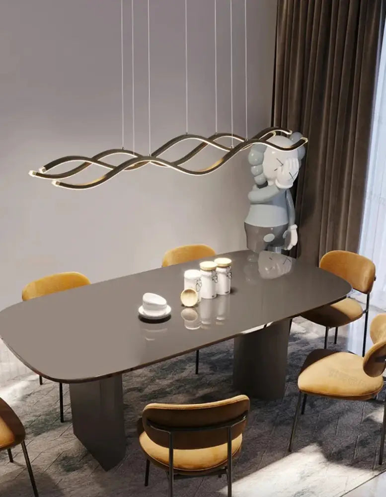 Modern gold-toned wave-shaped pendant light from DecorBites™ nordic chandeliers for dining room lighting