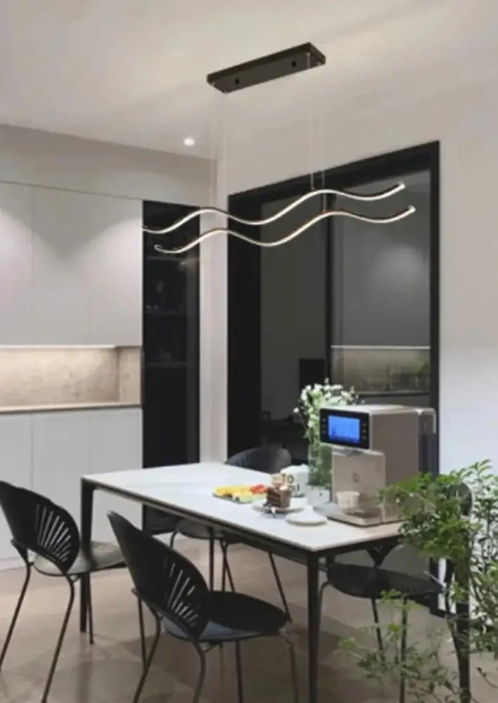 Modern minimalist pendant light with sleek curved silver arms and rectangular black fixture for stylish dining room nordic chandeliers