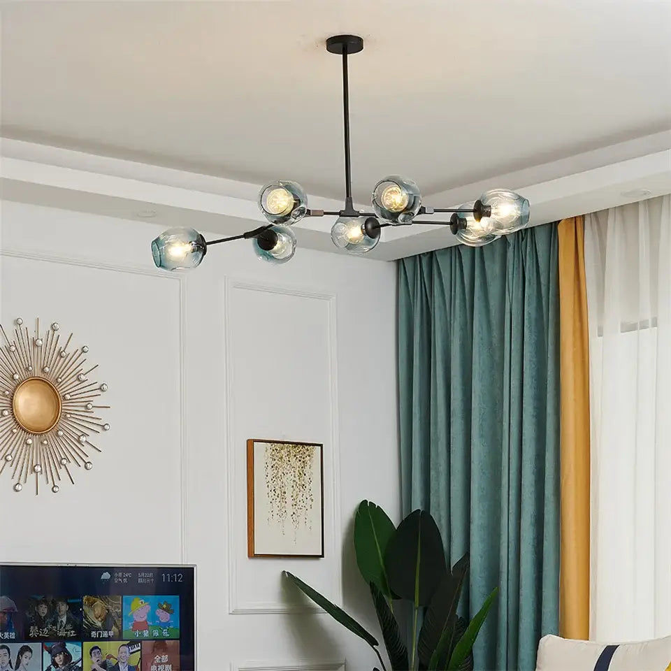 Modern black metal nordic glass ball led chandelier with six clear glass globe bulbs for elegant lighting
