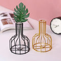 Decorbites™ nordic iron golden hydroponic vase set with black and gold wireframe design featuring a green monstera leaf