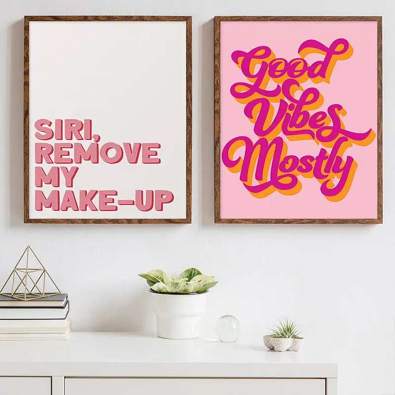 Two framed decorbites pink makeup funny quote art posters featuring pink and magenta text on white and soft pink backgrounds