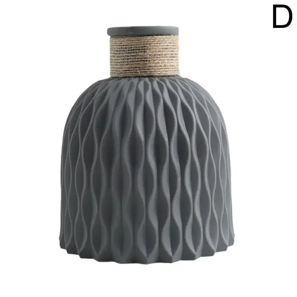 Gray ceramic plastic vase with wavy texture and natural twine rope band for flower arrangement by DecorBites