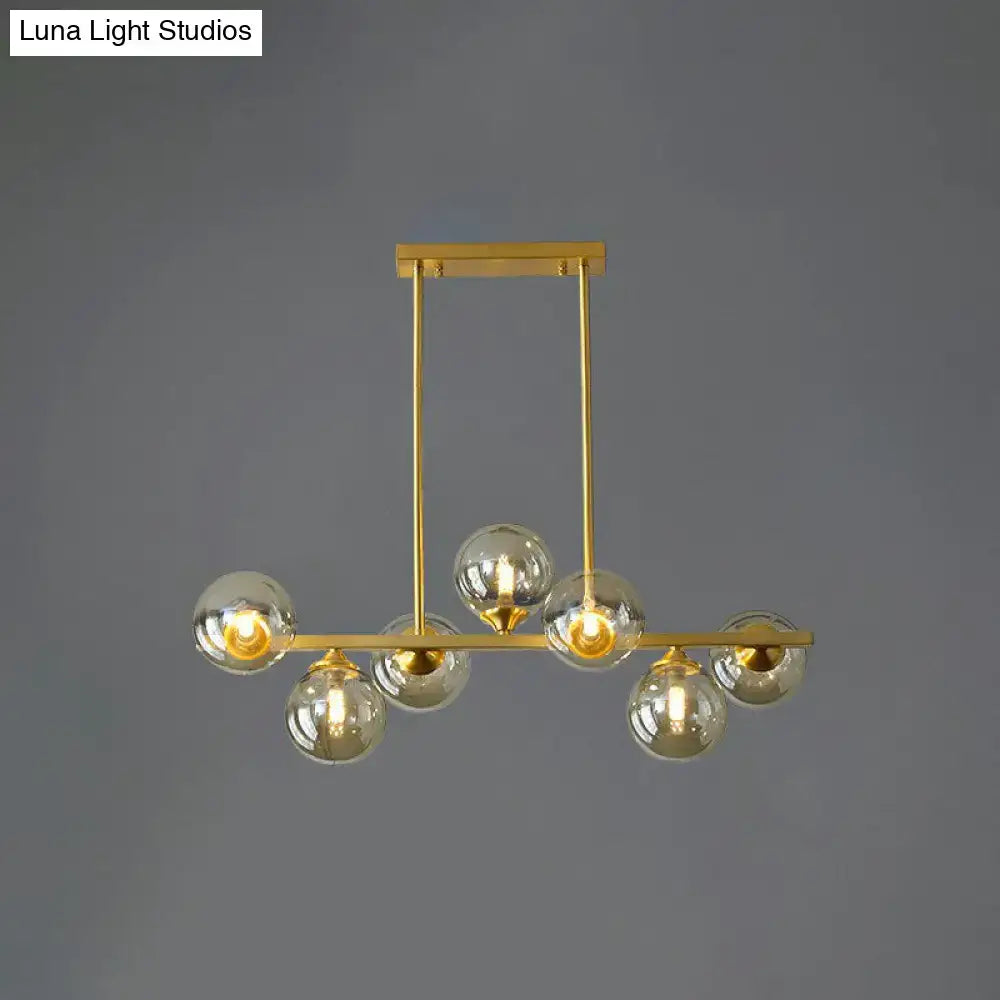 DecorBites™ Postmodern Gold Finish Amber Glass Ball Island Hanging Lamp for Table Illumination