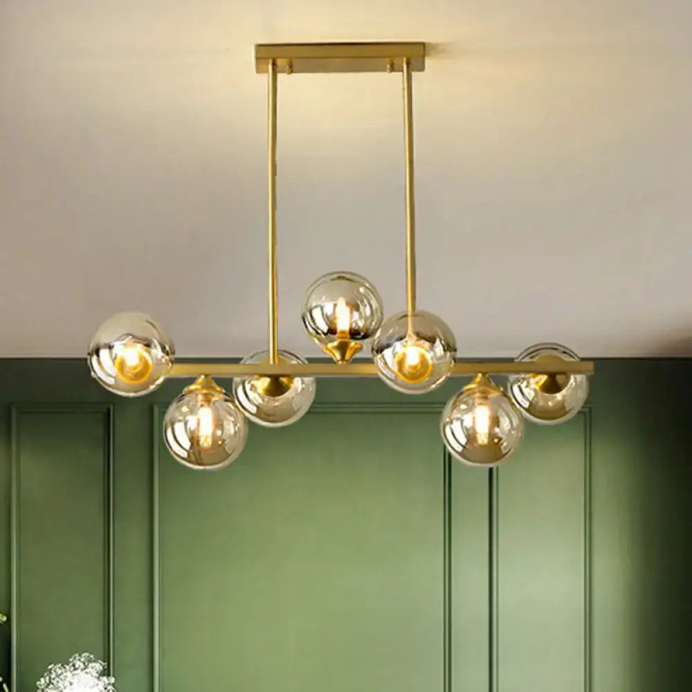 DecorBites™ Postmodern Gold Finish Amber Glass Ball Island Hanging Lamp for Table Illumination