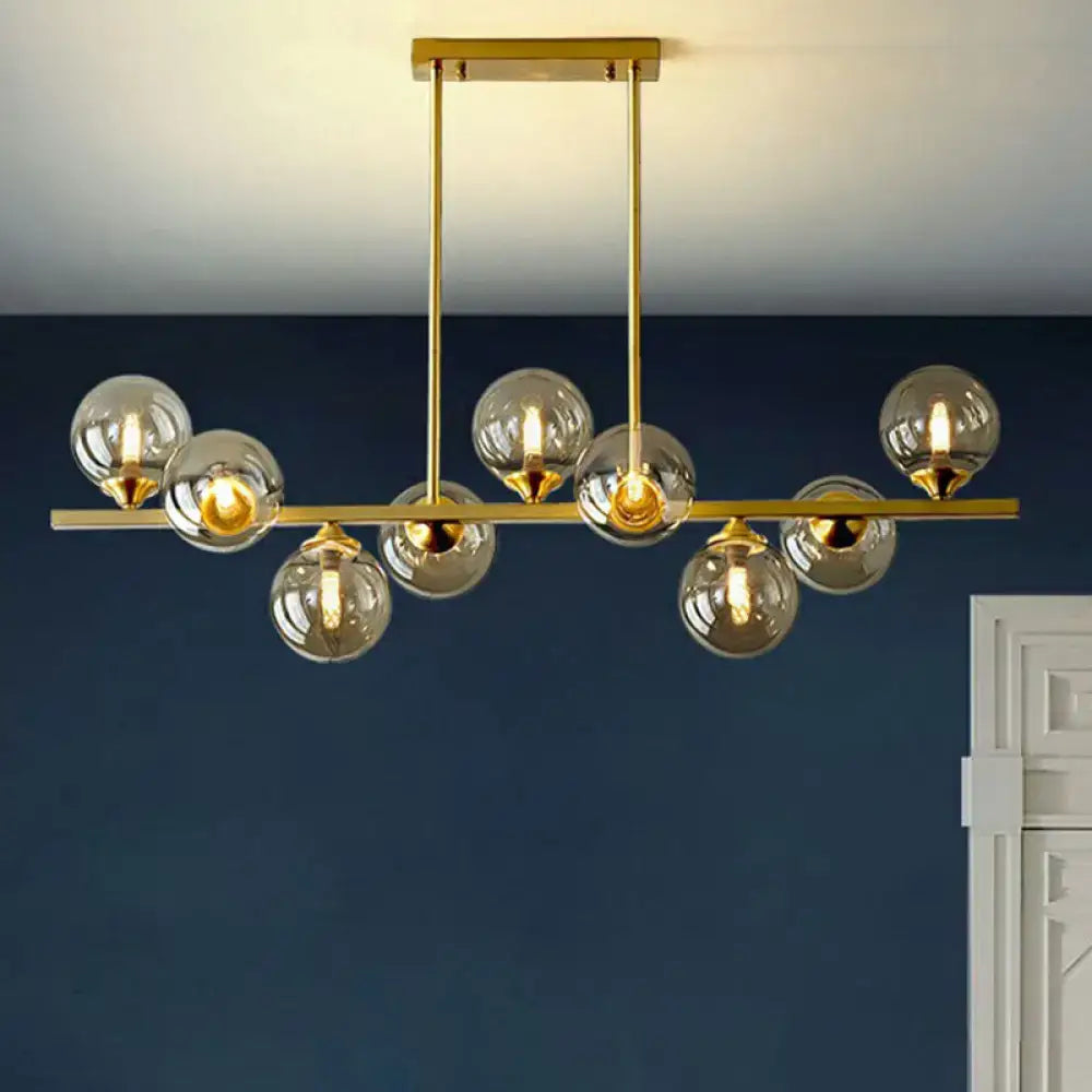 DecorBites™ Postmodern Gold Finish Amber Glass Ball Island Hanging Lamp for Table Illumination