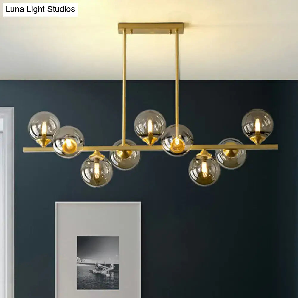 DecorBites™ Postmodern Gold Finish Amber Glass Ball Island Hanging Lamp for Table Illumination