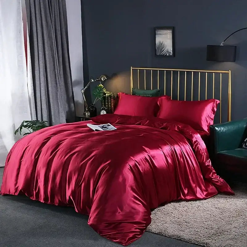 Rich crimson satin bed sheet and duvet cover set from decorbites™ premium bedding collection with a glossy finish