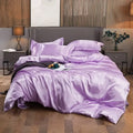 Lavender satin bed sheet and duvet cover with a glossy finish and matching pillows from decorbites premium bedding set