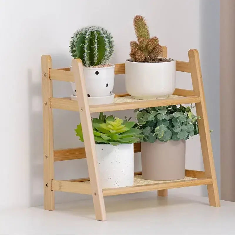 Light-colored wooden decorbites rattan 2-tier desktop organizer shelf with slanted sides and natural wood grain finish