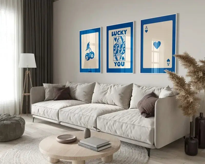Beige sectional sofa with soft cushioned seating and dark brown throw pillows beside decorbites retro wall art posters set