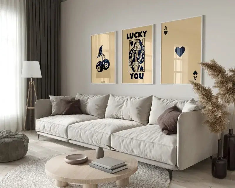 Beige modern sectional sofa with plush cushions and dark brown pillows in DecorBites retro wall art posters set Luck Queen Ace