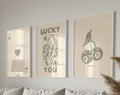 Three framed decorbites™ retro wall art posters set featuring queen of hearts theme with minimalist beige and gray prints