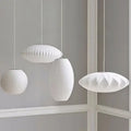 White ribbed silk led pendant lamp by decorbites with modern geometric design for stylish interior lighting