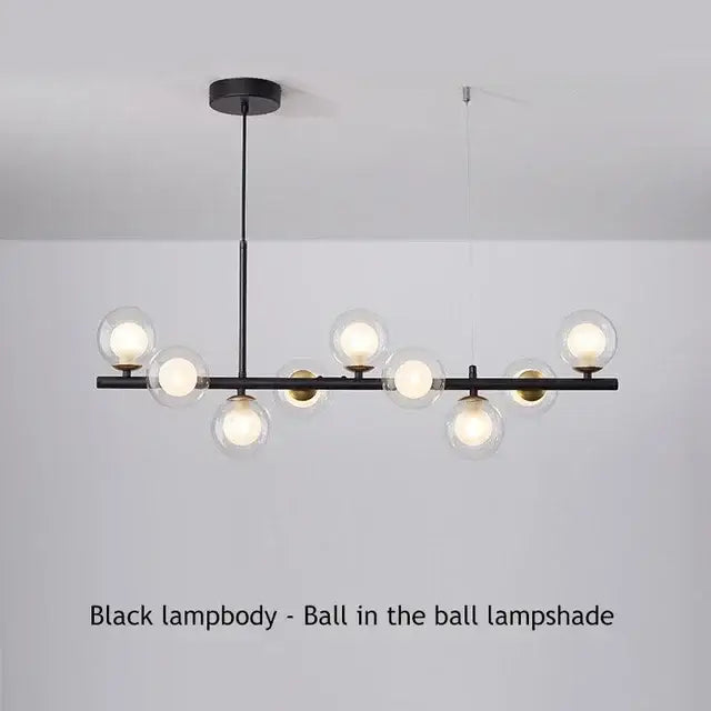 DecorBites sleek glass ball chandelier with black frame and clear glass globes for dining room lighting