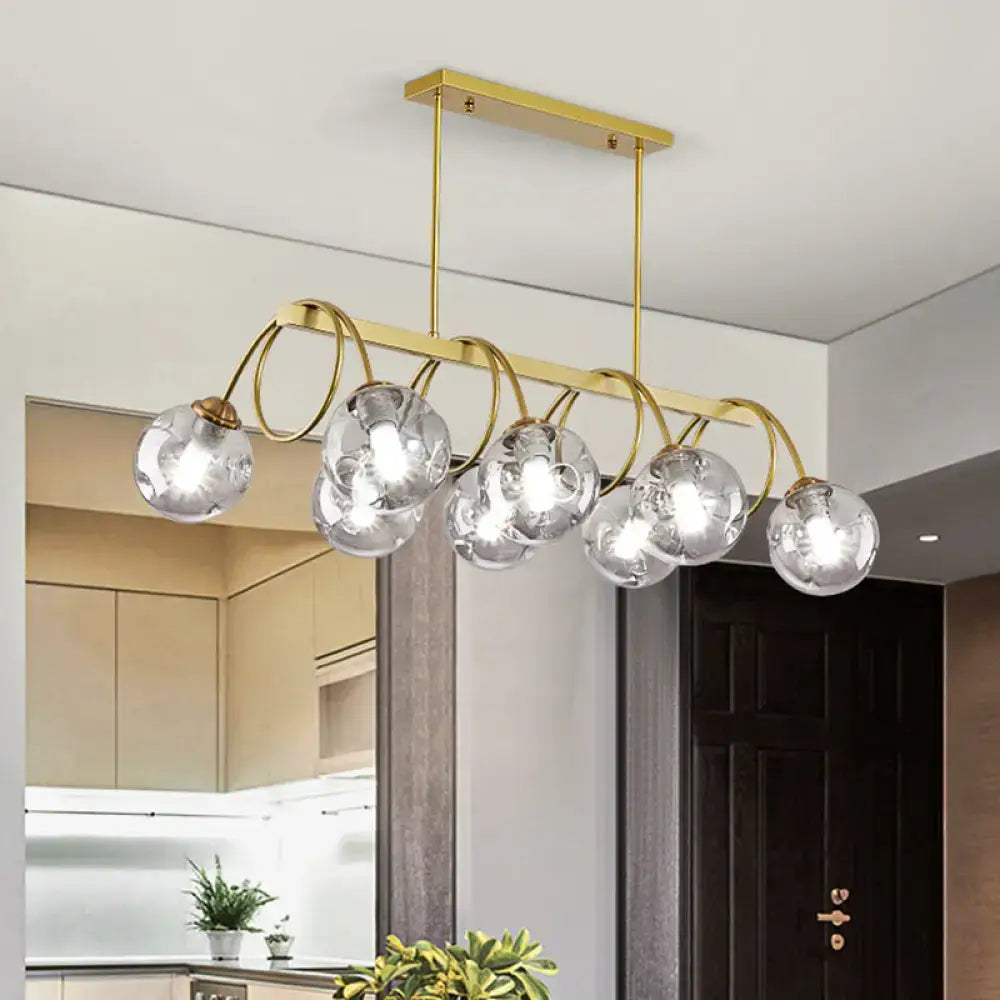 DecorBites™ Sleek Gold Spiral Island Light - Post-Modern Metal Ceiling Hang Lamp with Ball Glass Shade