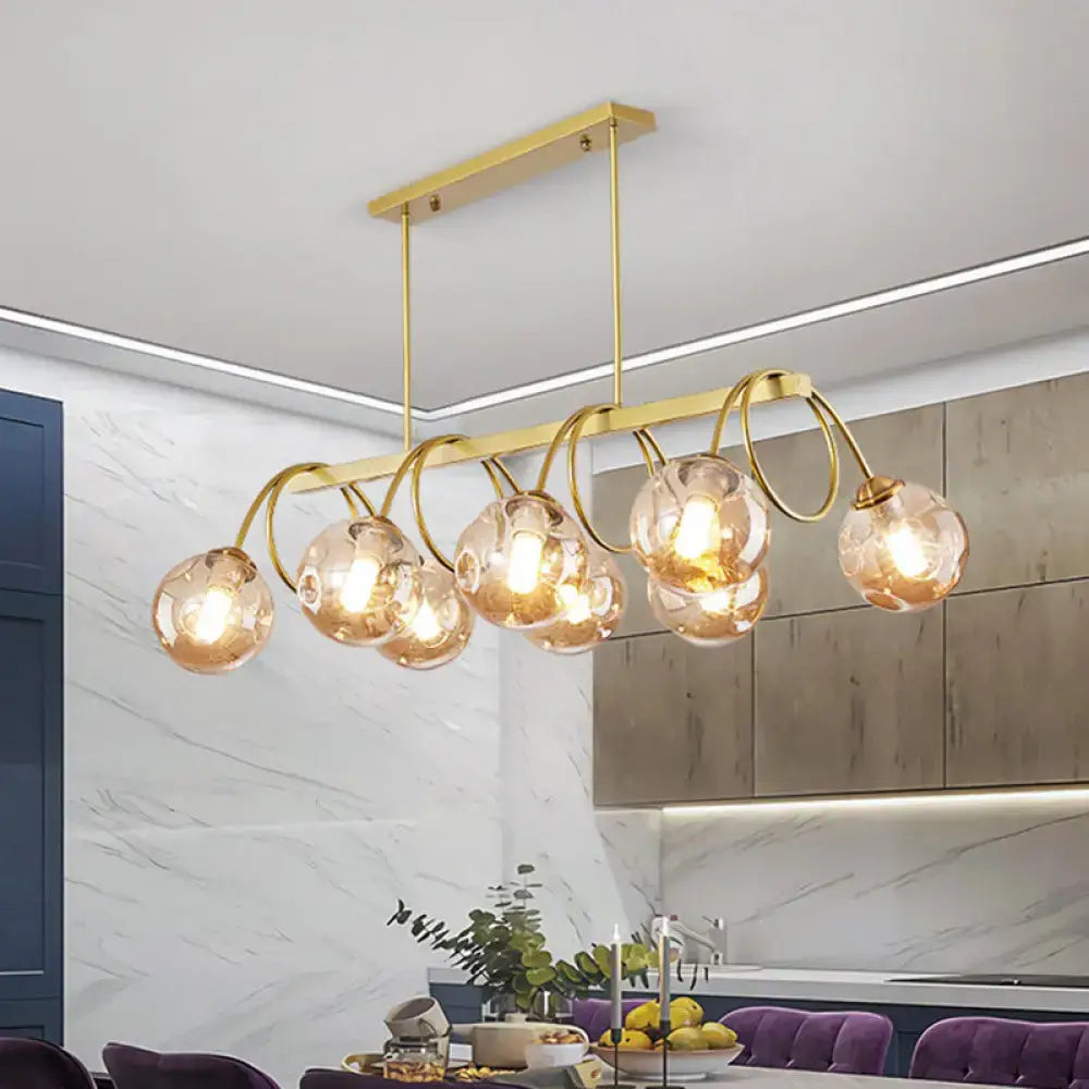 DecorBites™ Sleek Gold Spiral Island Light - Post-Modern Metal Ceiling Hang Lamp with Ball Glass Shade