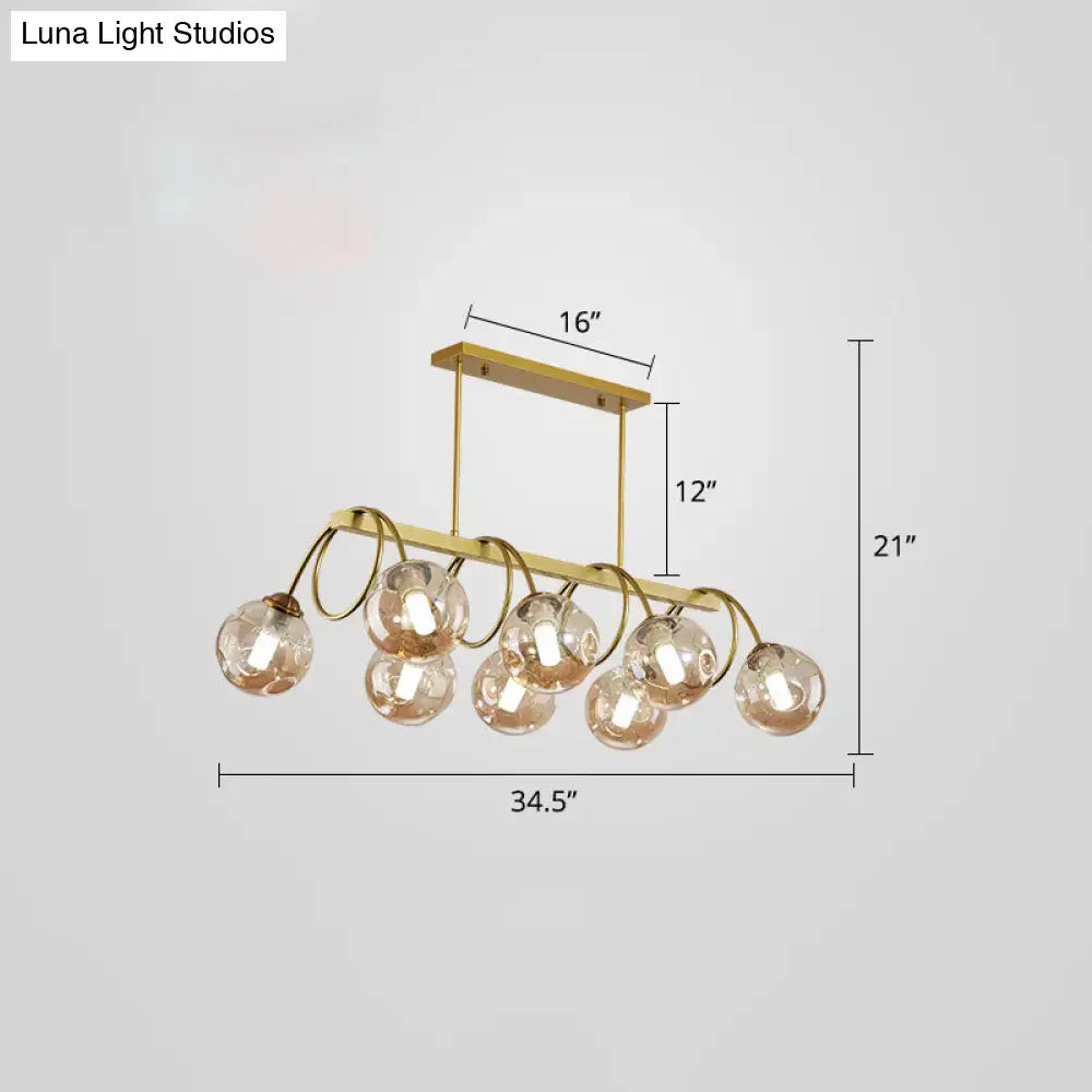 DecorBites™ Sleek Gold Spiral Island Light - Post-Modern Metal Ceiling Hang Lamp with Ball Glass Shade