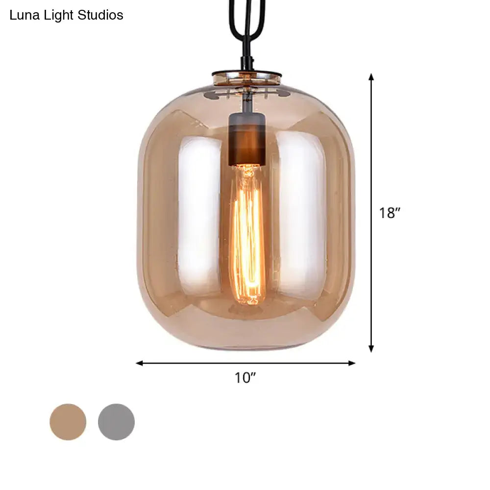 Decorbites™ smoke gray cognac glass pendant lamp with warm amber glass and exposed filament bulb in sleek rounded design