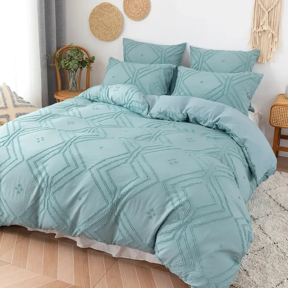 Teal-colored quilted microfiber duvet cover set with geometric embroidery pattern from DecorBites soft tufted cover set