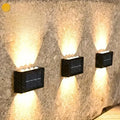 Decorbites™ black rectangular solar outdoor wall lights with integrated led bulbs casting warm focused beams