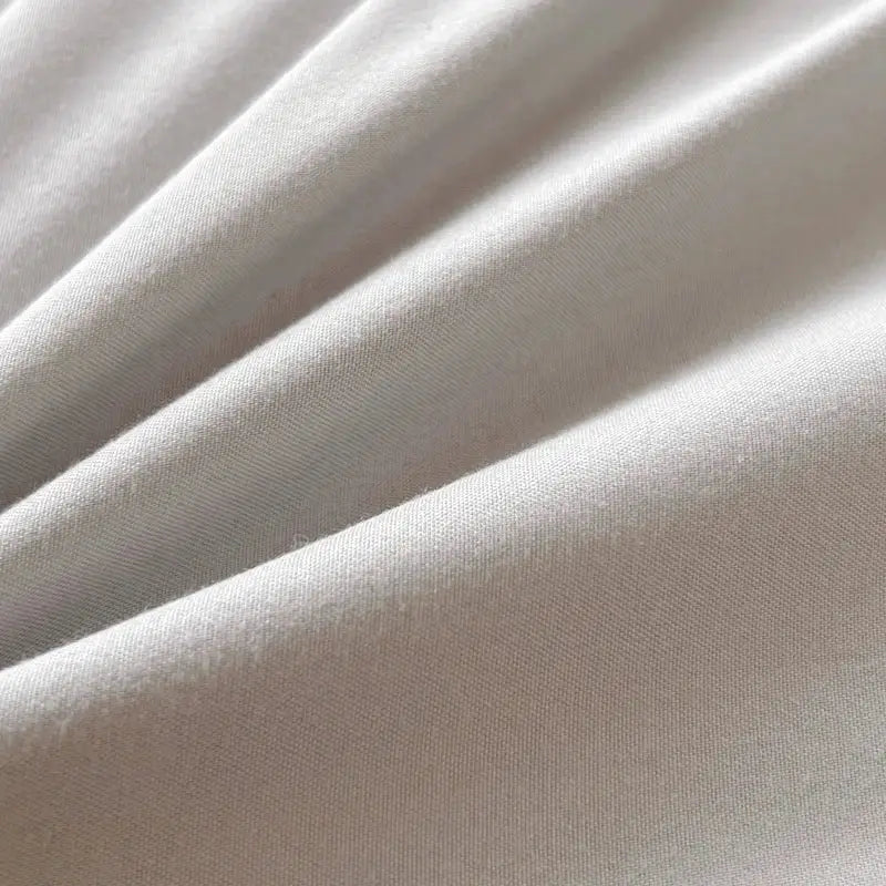 Soft off-white solid color brush fabric duvet cover from decorbites™ 4 piece bedding set with subtle sheen