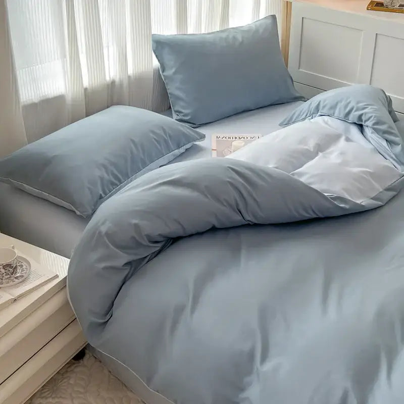 Soft pastel blue solid color quilted duvet cover set with matching pillowcases in brush fabric by DecorBites™
