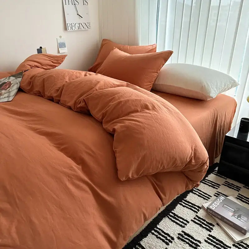 Warm terracotta decorbites solid cotton bedding set with textured fabric finish includes duvet cover and sheet