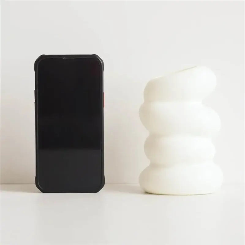 White ceramic spiral white vase with stacked rounded segments for home decoration by decorbites