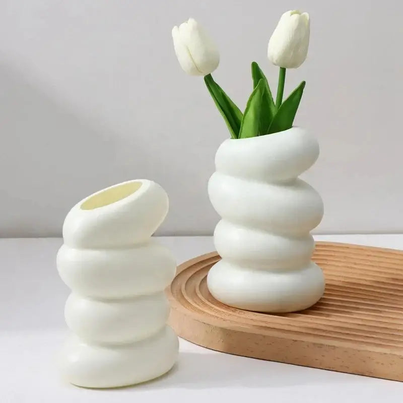 White ceramic spiral white vase with stacked rounded ribbed design for home decoration by decorbites