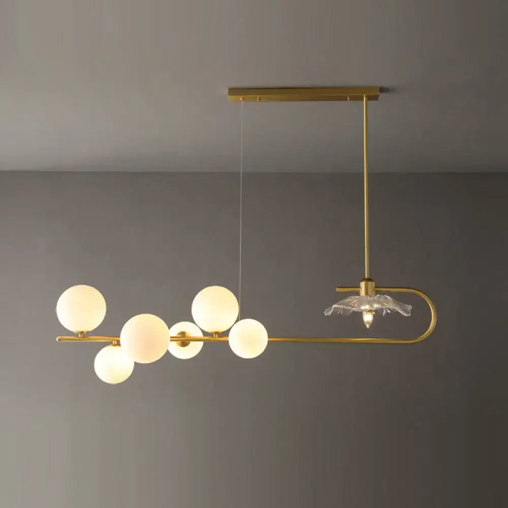DecorBites™ Stylish Brass Finish Postmodern Suspension Lamp with Glass Shade - Creative Island Light featuring Ball and Lotus Leaf Design