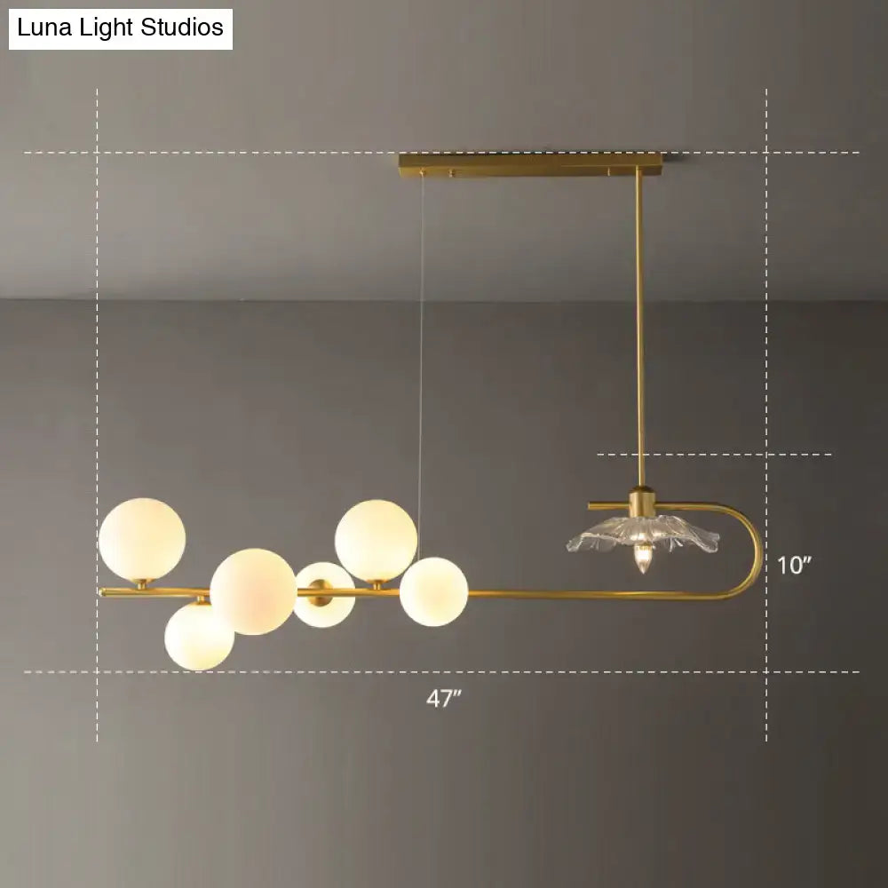 DecorBites™ Stylish Brass Finish Postmodern Suspension Lamp with Glass Shade - Creative Island Light featuring Ball and Lotus Leaf Design