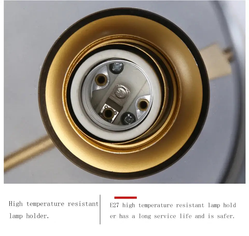 Gold-colored e27 lamp holder with ceramic base and metal contacts for modern chandelier lighting by DecorBites™