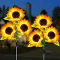 Set of five decorbites™ sunflower solar led garden lights with auto brightness, glowing yellow petals, and solar panel stakes